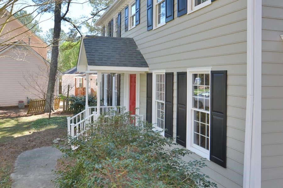 108 Rother Lane Durham, NC 27707 - Photo 3 of 34 a view of a house with backyard and balcony