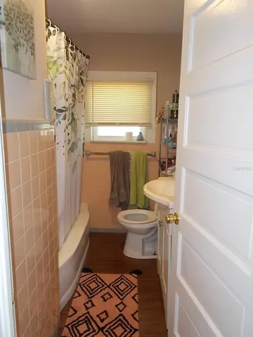 a view of a hallway with a room