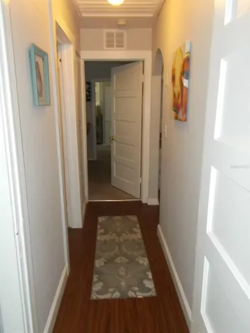 a kitchen with a sink cabinets and window