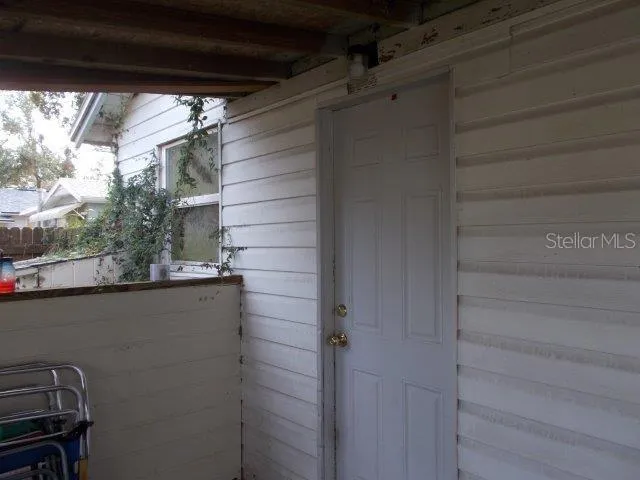 a front view of house with yard and trees