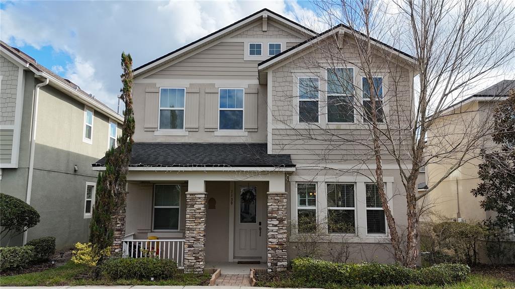 a front view of a house with garden