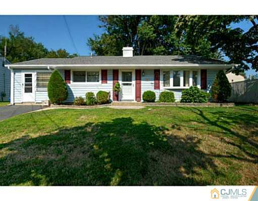 22 Sanders Road Edison, NJ 08817 - Photo 1 of 25 a front view of house with yard and green space