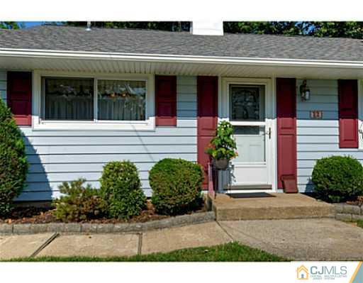 22 Sanders Road Edison, NJ 08817 - Photo 2 of 25 a view of a house with potted plants