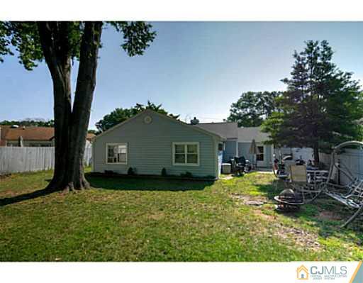 22 Sanders Road Edison, NJ 08817 - Photo 23 of 25 a house view with a garden space