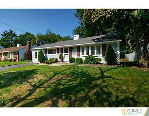 22 Sanders Road Edison, NJ 08817 - Photo 24 of 25 a front view of house with yard and green space