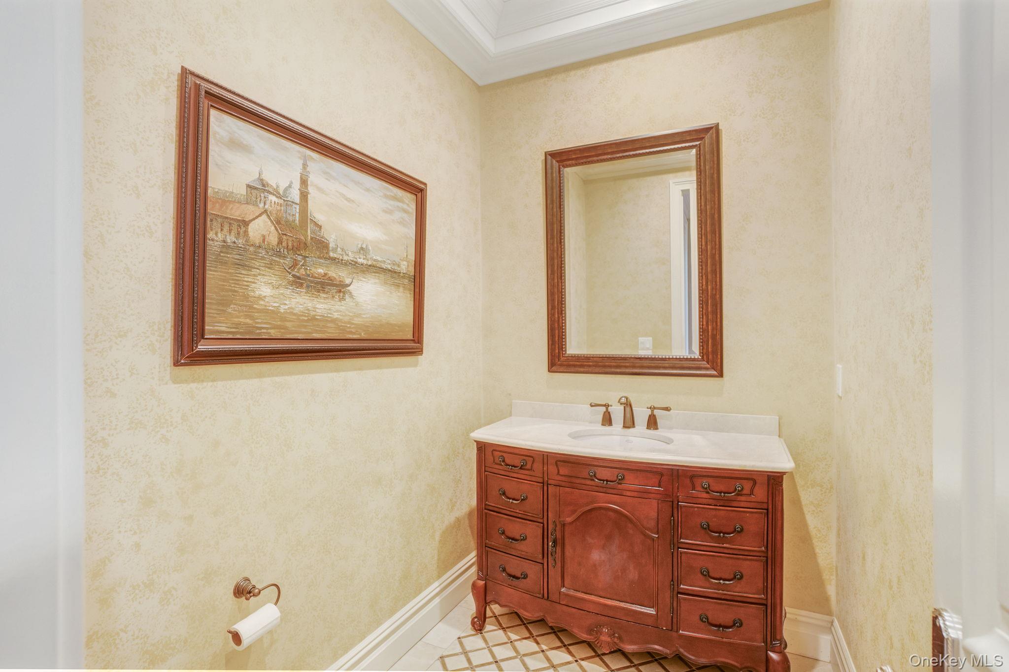 1 Norgate Road Glen Head, NY 11545 - Photo 18 of 42 a bathroom with a sink and a mirror