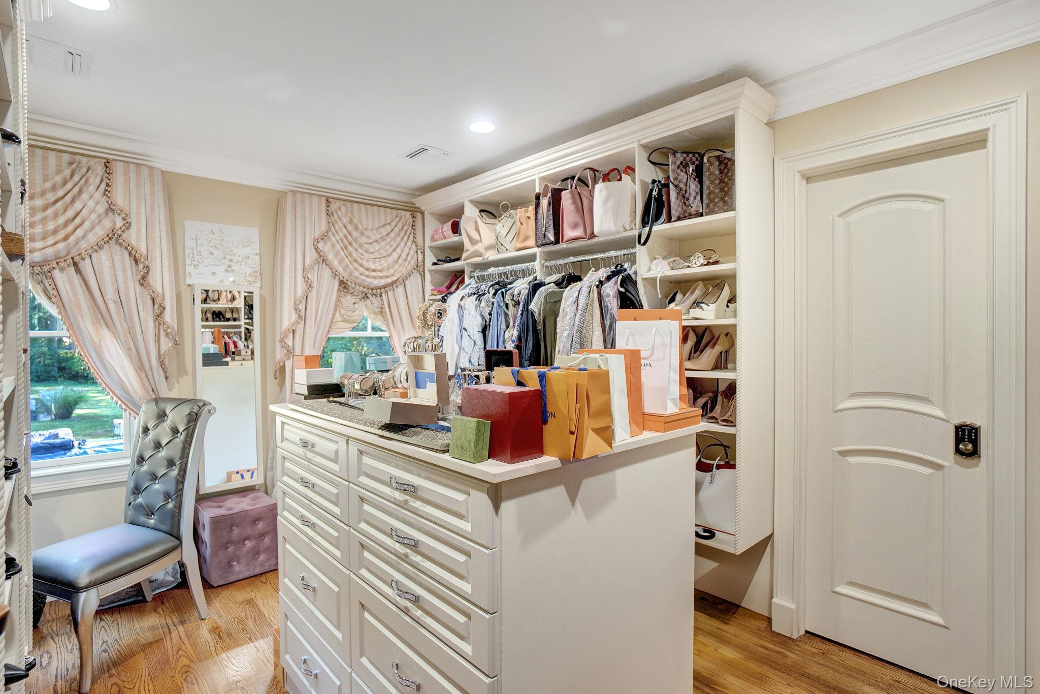 1 Norgate Road Glen Head, NY 11545 - Photo 24 of 42 a view of living room filled with furniture and a book shelf