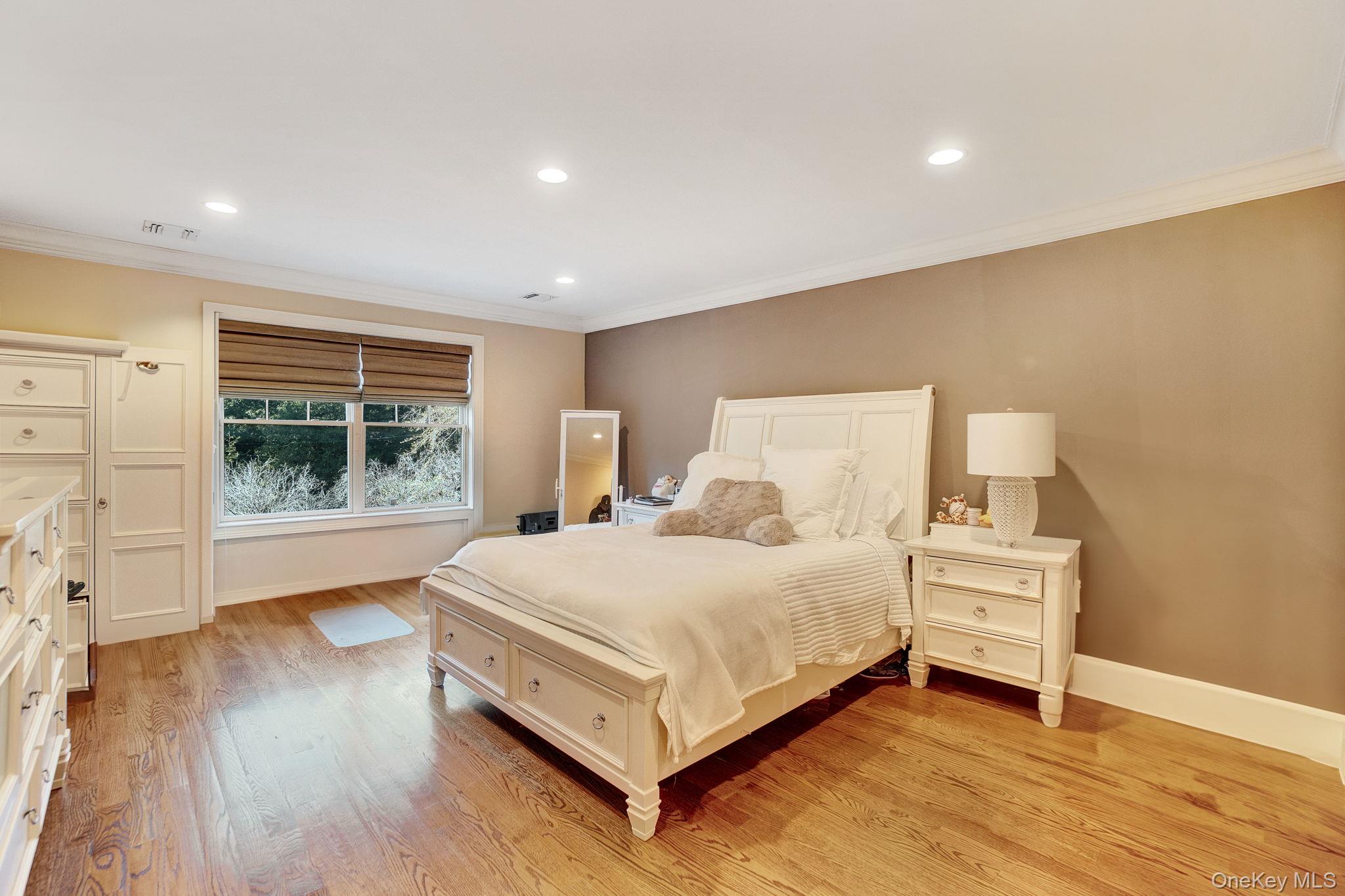 1 Norgate Road Glen Head, NY 11545 - Photo 25 of 42 a bedroom with a bed and window