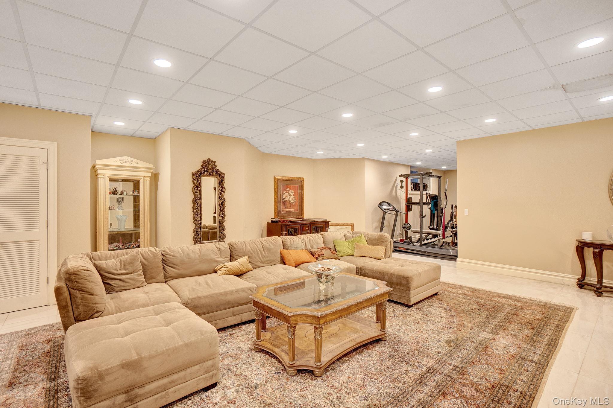 1 Norgate Road Glen Head, NY 11545 - Photo 32 of 42 a living room with furniture and a couch