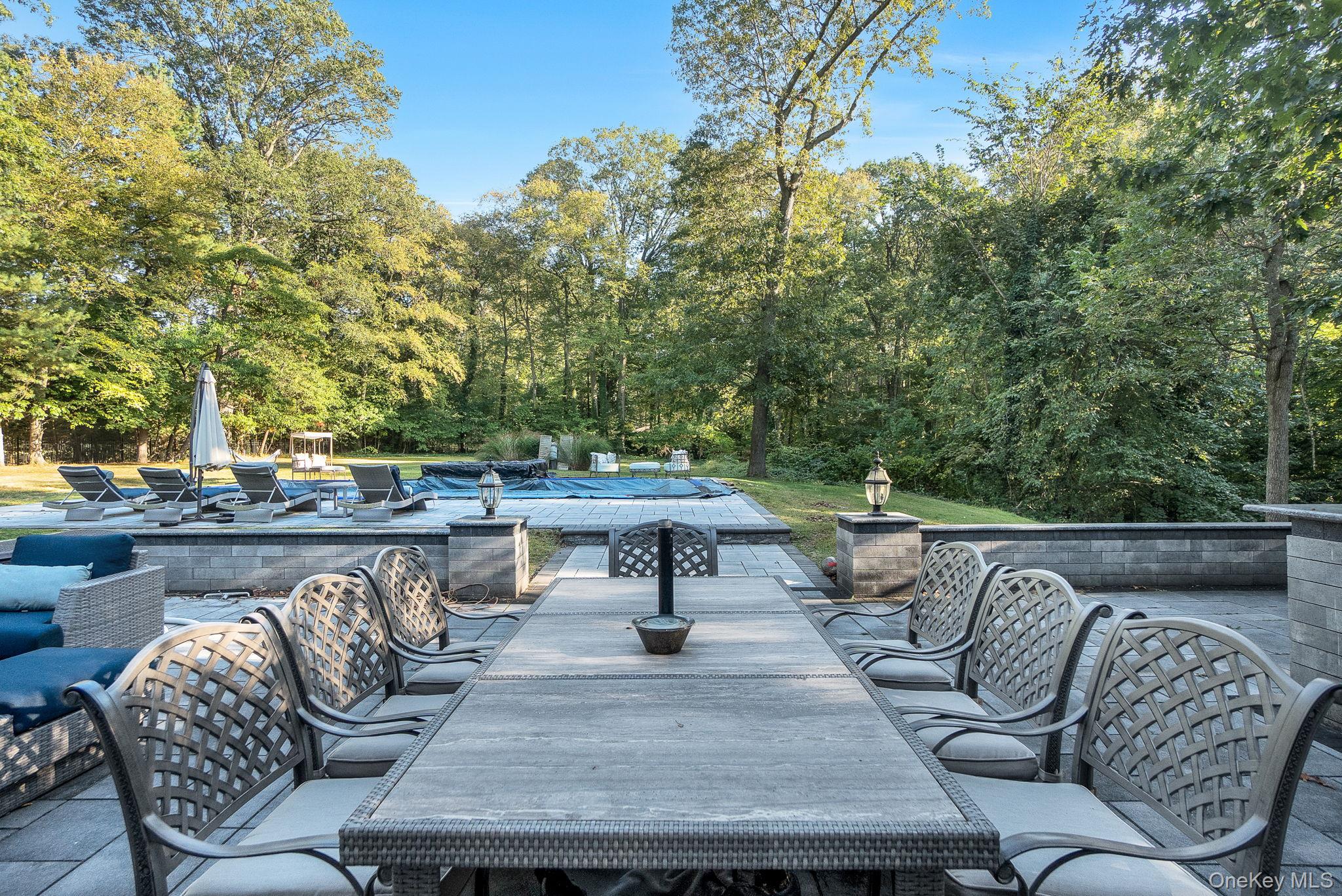 1 Norgate Road Glen Head, NY 11545 - Photo 37 of 42 a view of a patio with couches table and chairs