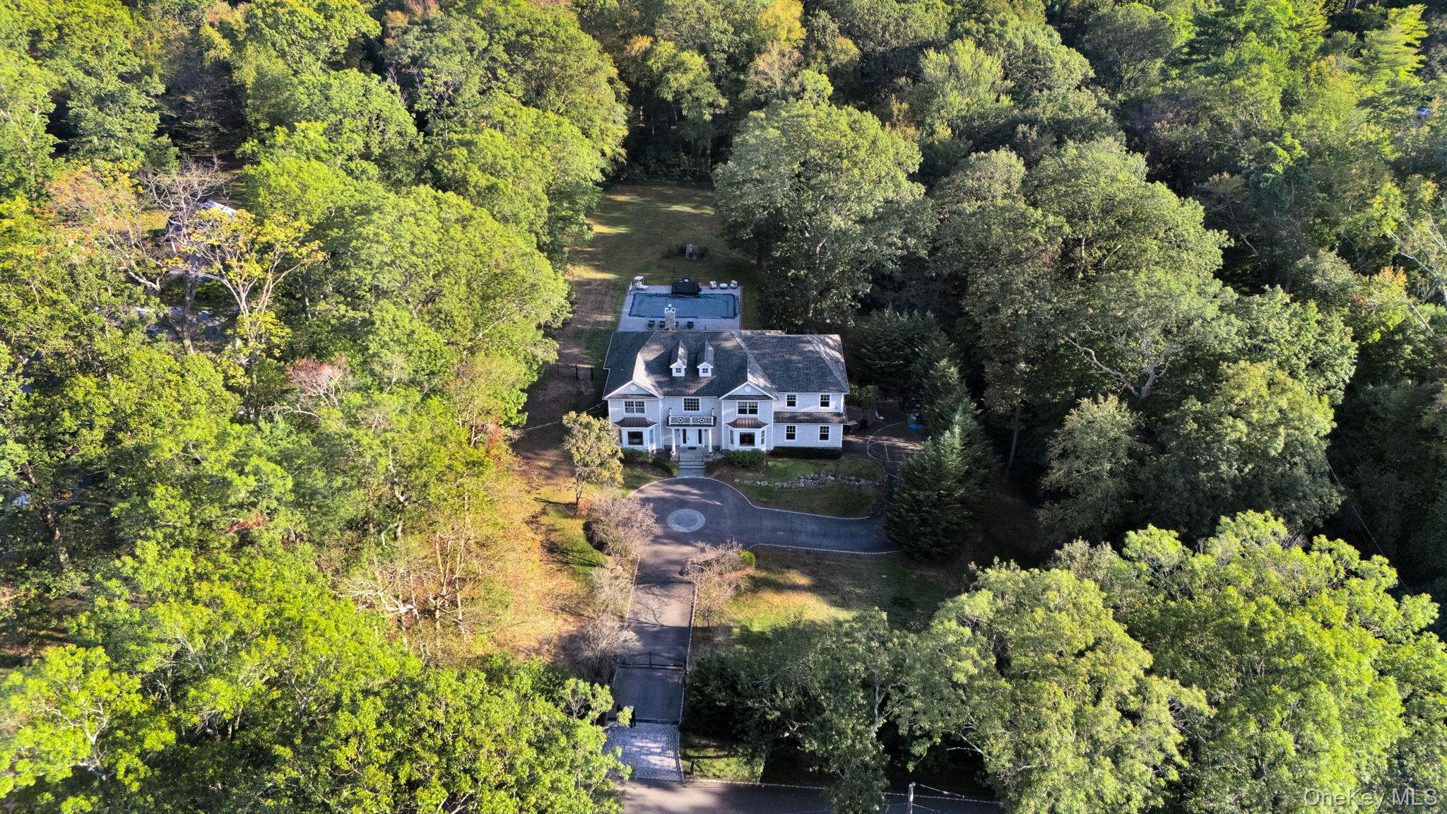1 Norgate Road Glen Head, NY 11545 - Photo 40 of 42 an aerial view of residential house with outdoor space and trees all around