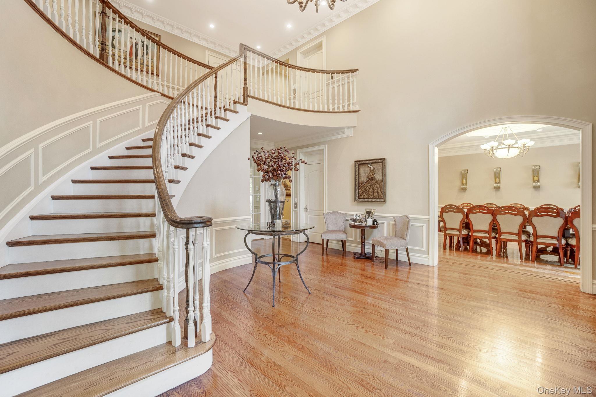 1 Norgate Road Glen Head, NY 11545 - Photo 6 of 42 a view of entryway dining room and hall with wooden floor