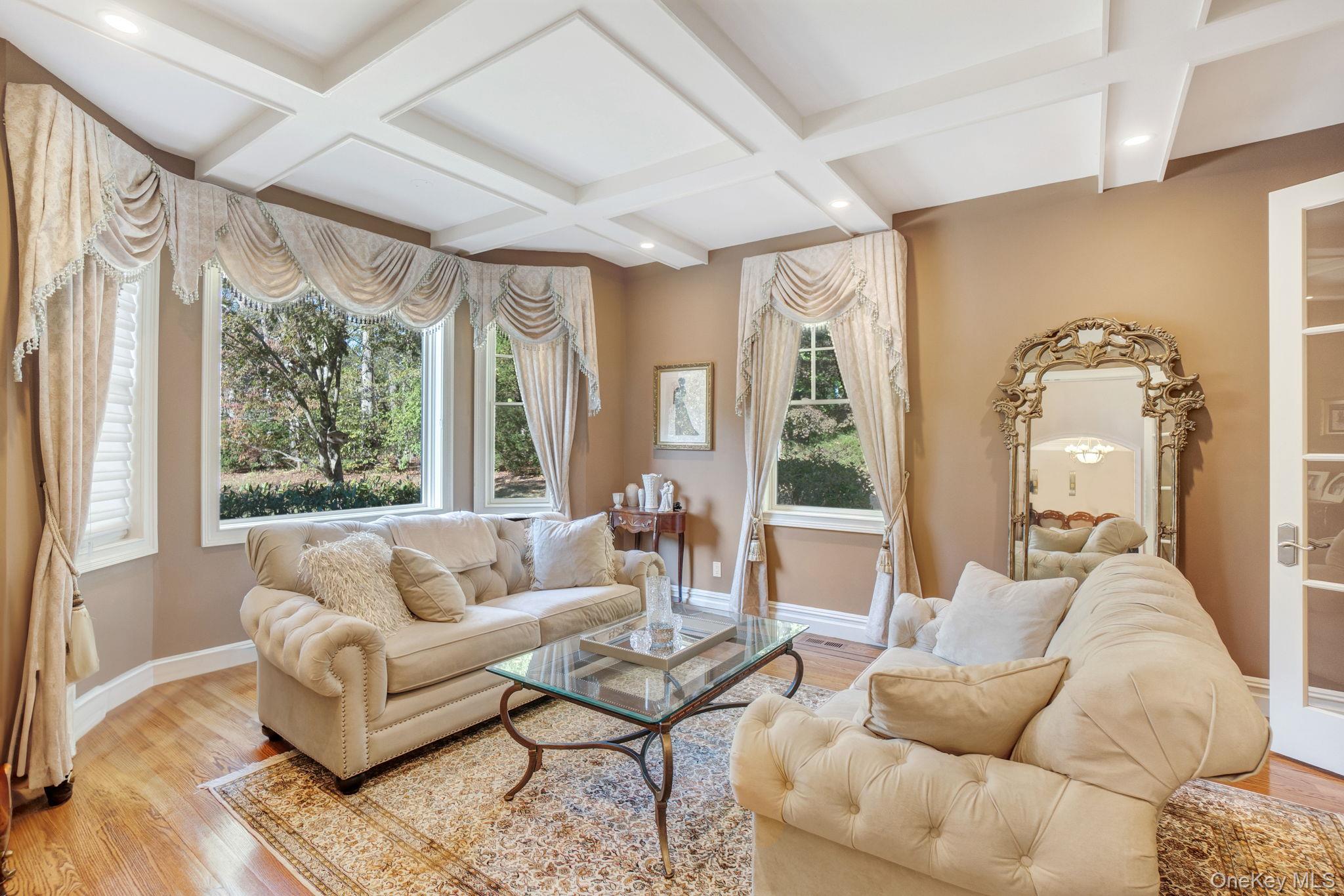 1 Norgate Road Glen Head, NY 11545 - Photo 8 of 42 a living room with furniture and a large window