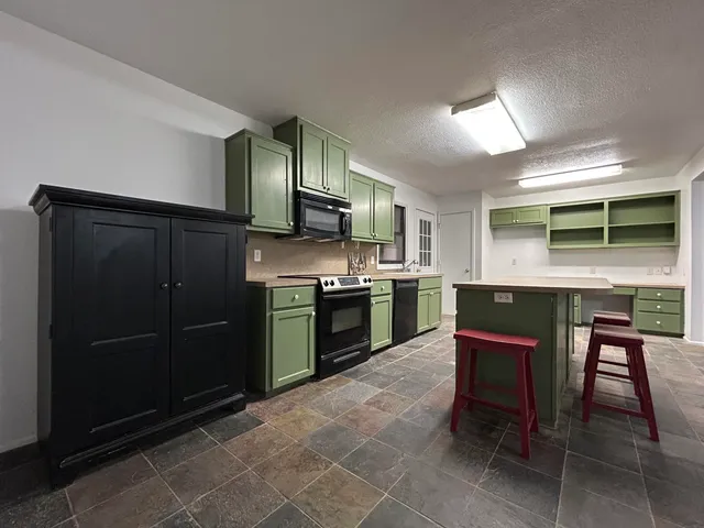 a bathroom with a toilet and a sink