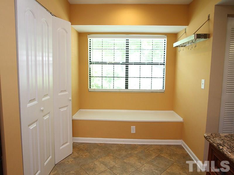 2432 Condor Court, Unit 2432 Raleigh, NC 27615 - Photo 8 of 11 a view of an empty room with a window