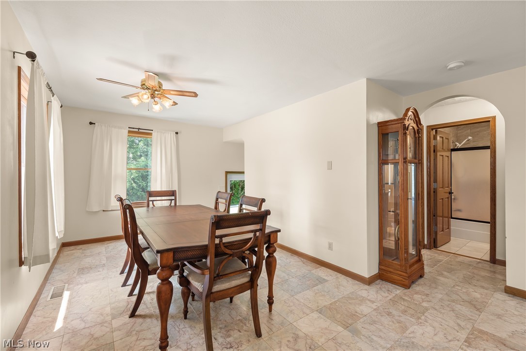 9990 Broadview Road Broadview Heights, OH 44147 - Photo 13 of 47 Dining room with a ceiling fan and baseboards