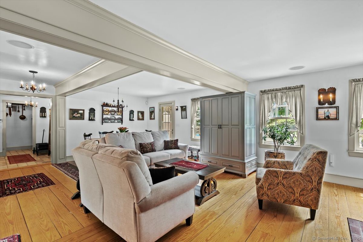 174 Bethel Road Griswold, CT 06351 - Photo 16 of 40 a living room with furniture and a large window