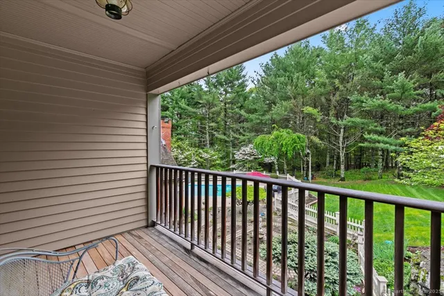 a view of balcony with a potted plant
