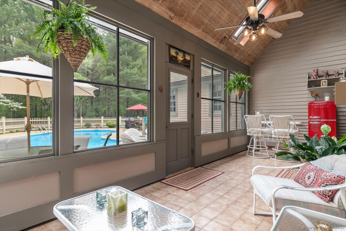 174 Bethel Road Griswold, CT 06351 - Photo 34 of 40 a living room with furniture and a large window