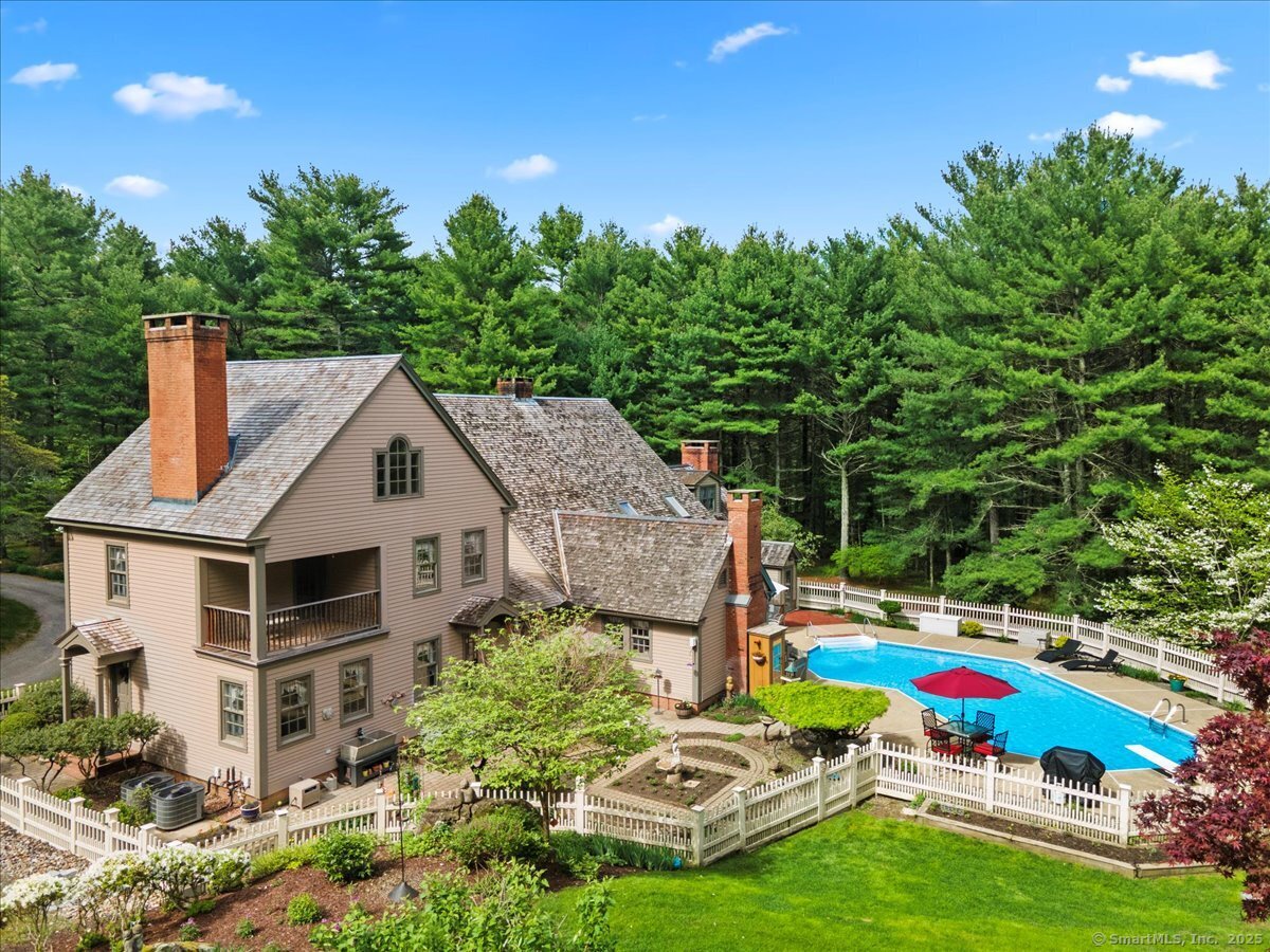 174 Bethel Road Griswold, CT 06351 - Photo 35 of 40 a aerial view of a house with swimming pool and garden