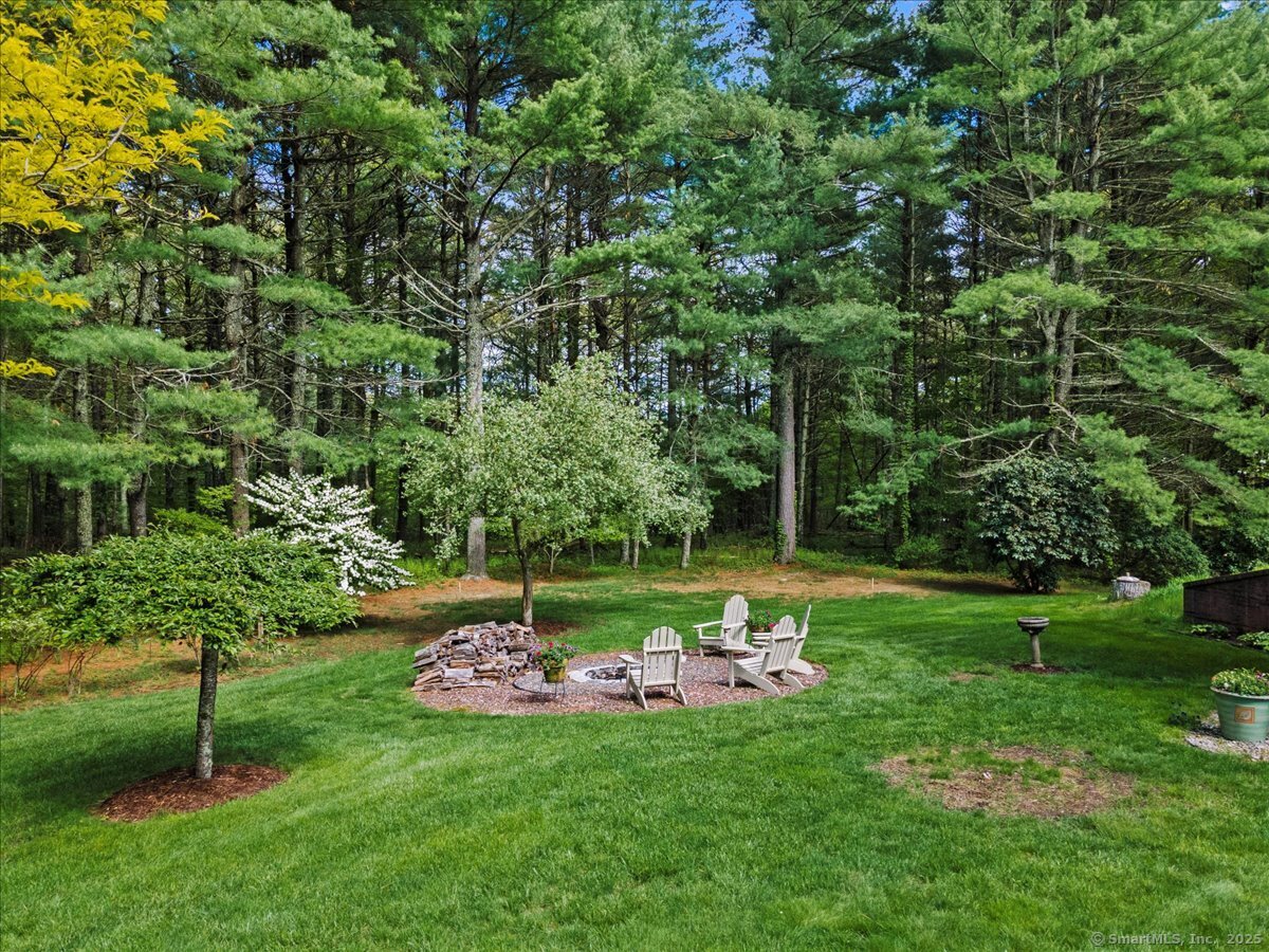 174 Bethel Road Griswold, CT 06351 - Photo 38 of 40 a front view of a house with a yard