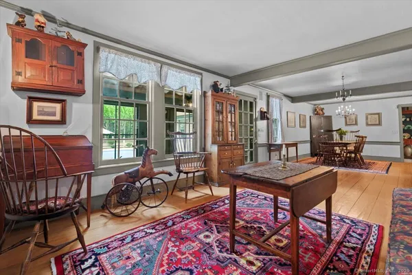 a view of a livingroom with furniture