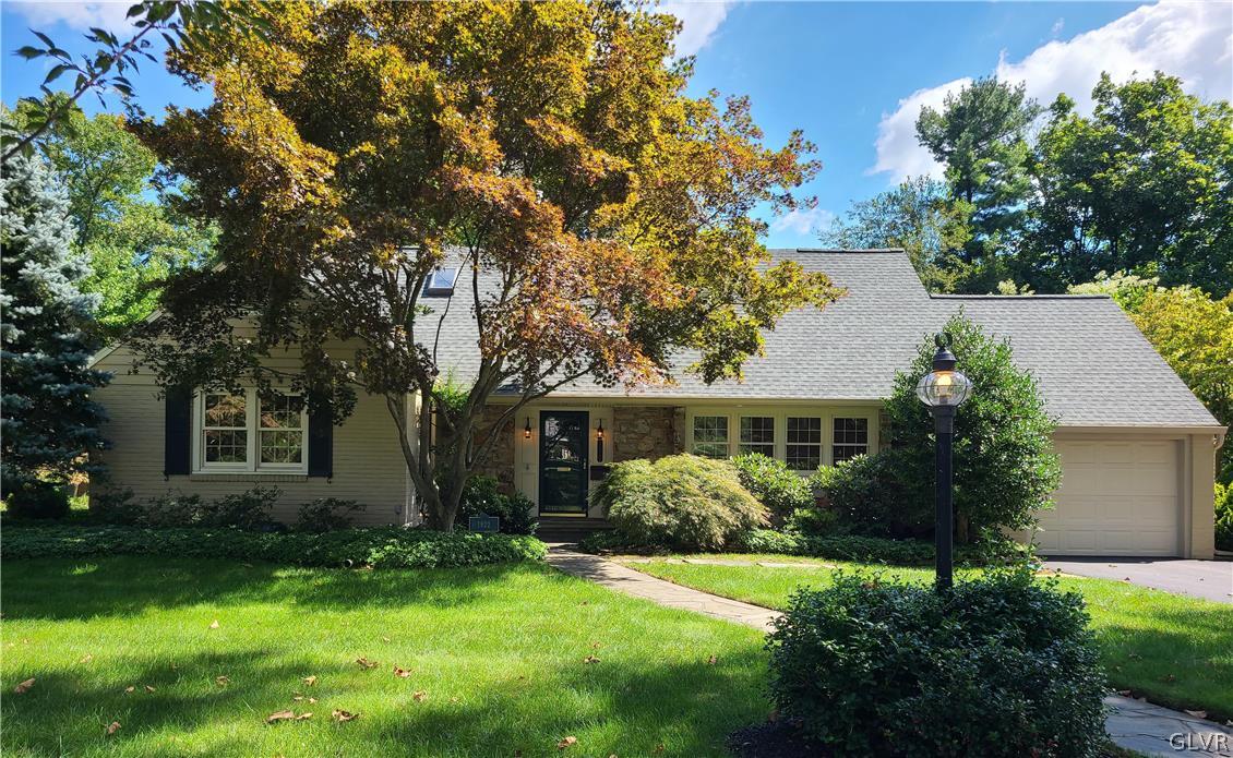 front view of house with a yard