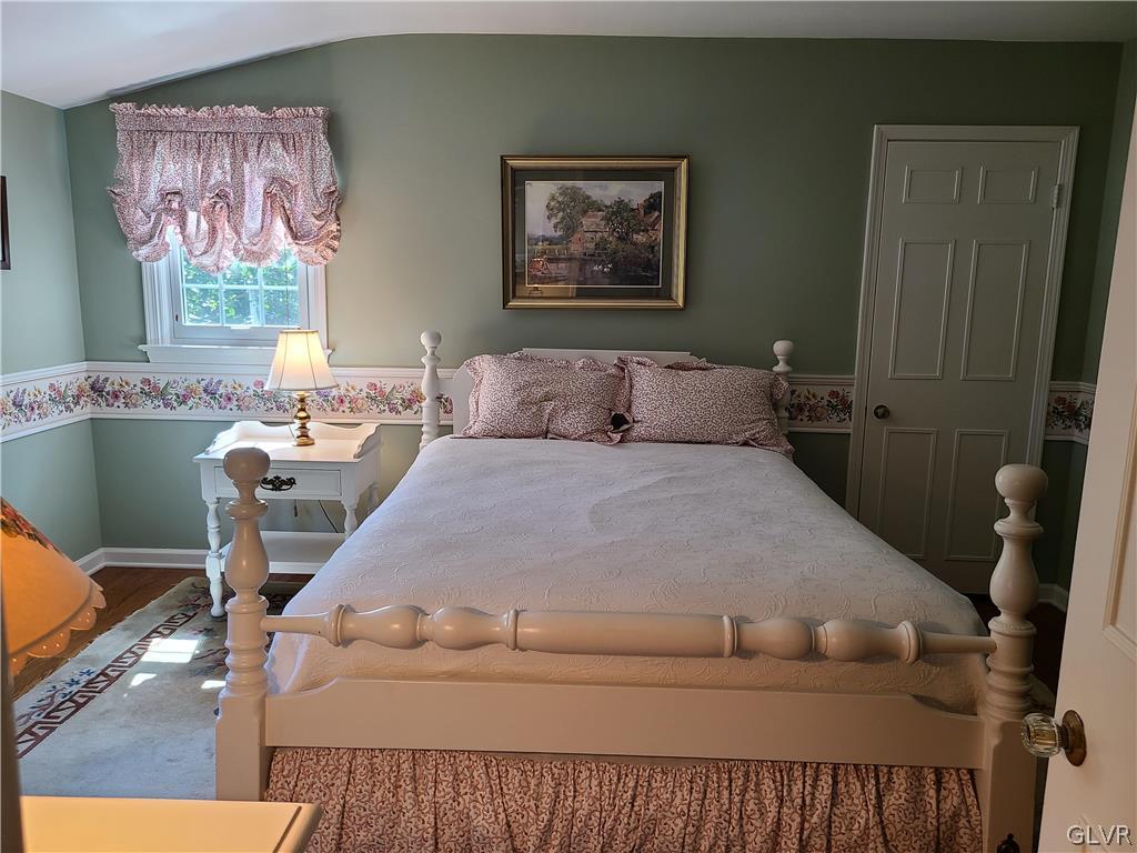 1922 Sycamore Street Bethlehem, PA 18017 - Photo 16 of 18 a bed sitting in a bedroom next to a window