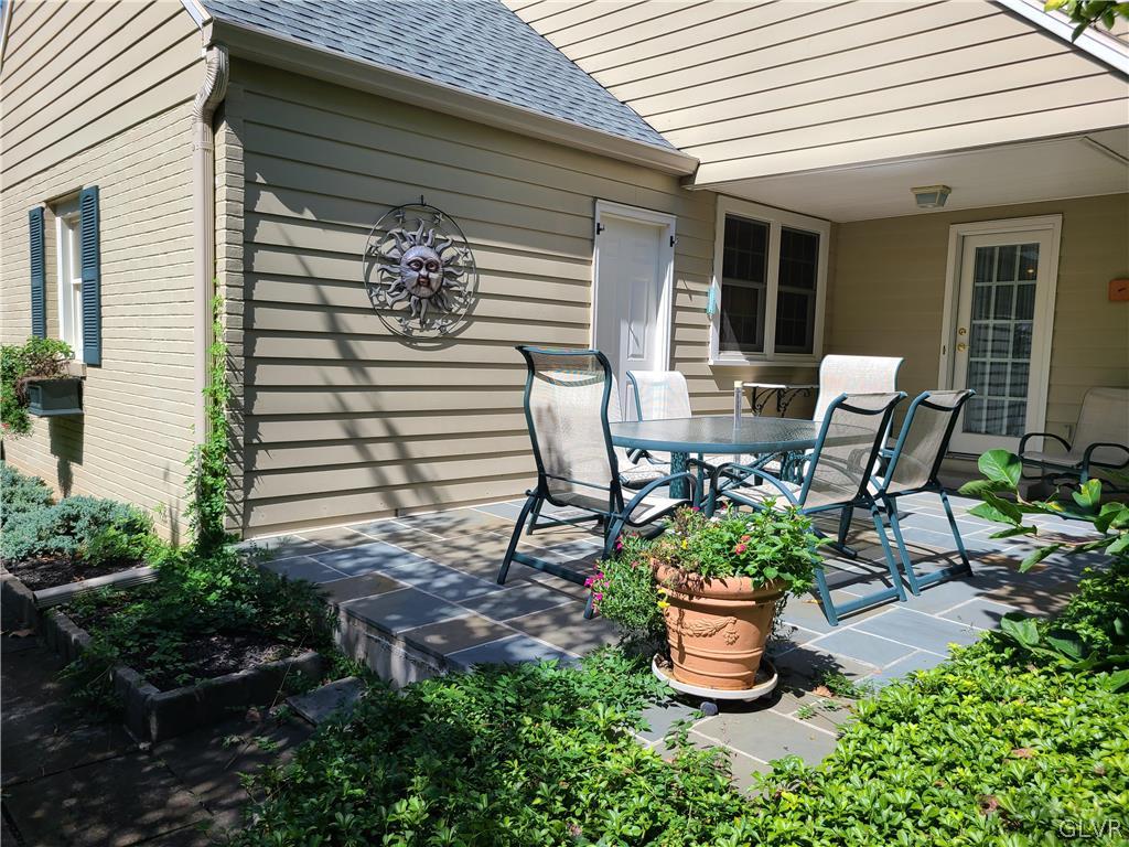 1922 Sycamore Street Bethlehem, PA 18017 - Photo 18 of 18 a front view of a house with a chairs potted plants and large window