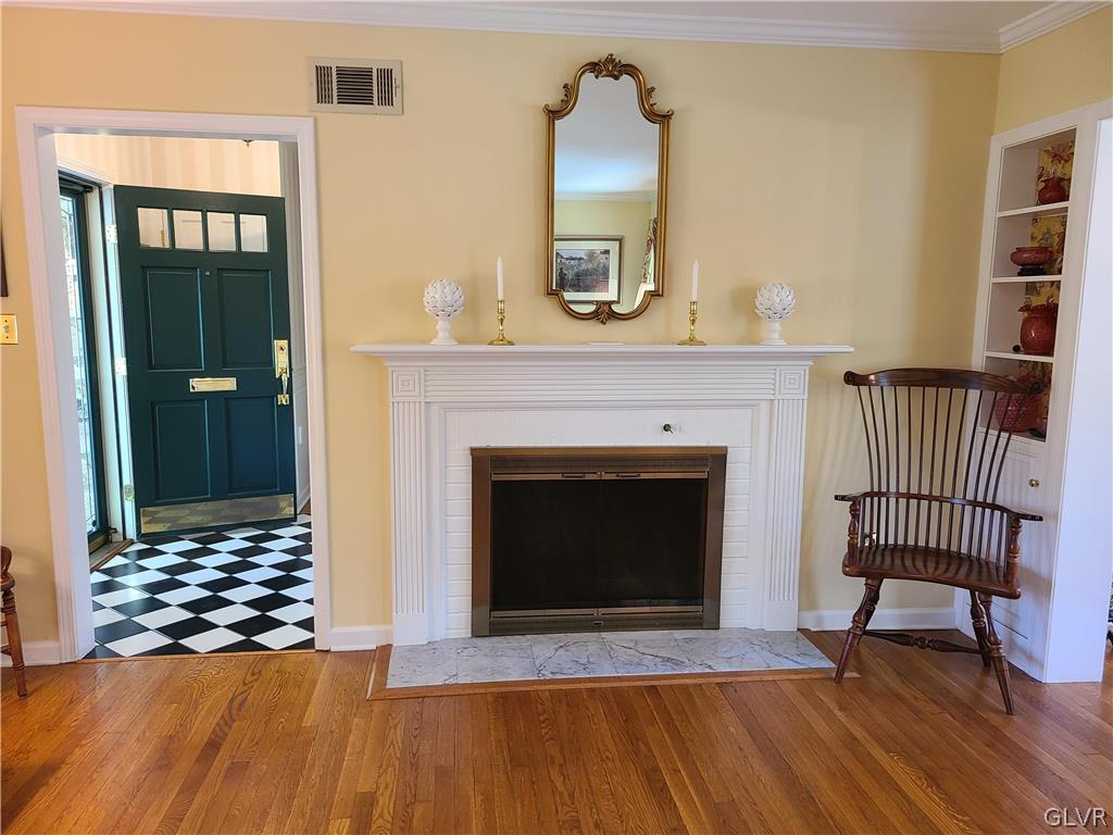 1922 Sycamore Street Bethlehem, PA 18017 - Photo 3 of 18 a living room with furniture and a fireplace