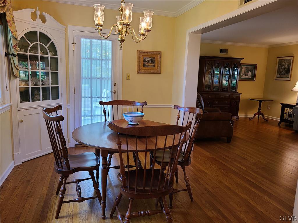 1922 Sycamore Street Bethlehem, PA 18017 - Photo 6 of 18 a view of a dining room with furniture and wooden floor