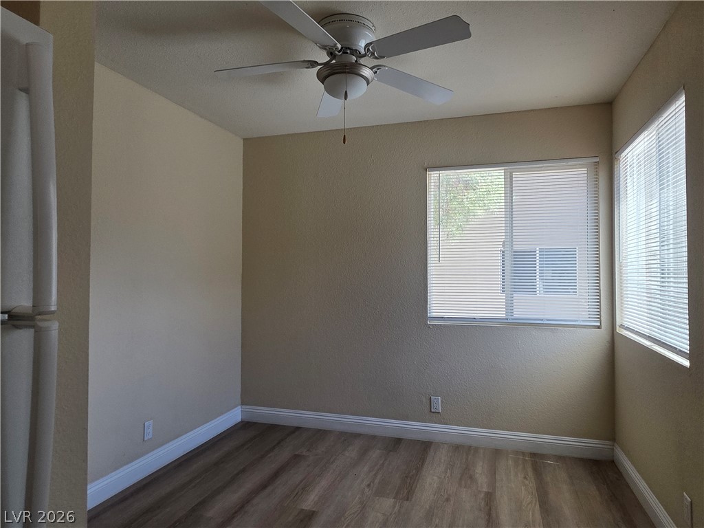 1844 North Decatur Boulevard, Unit 204 Las Vegas, NV 89108 - Photo 7 of 21 Clean lines and rich wood-inspired flooring define this versatile interior space.