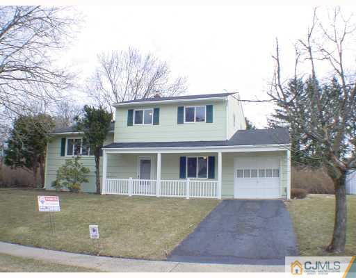 7 Barker Road Somerset, NJ 08873 - Photo 1 of 10 a view of a yard in front of a white house