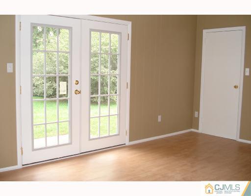 7 Barker Road Somerset, NJ 08873 - Photo 4 of 10 a view of an empty room with a window