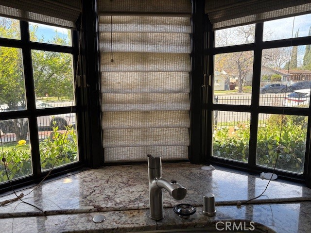 10918 Reseda Boulevard Porter Ranch, CA 91326 - Photo 6 of 19 a living room with a large window