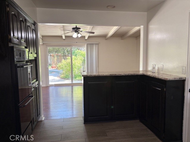 10918 Reseda Boulevard Porter Ranch, CA 91326 - Photo 8 of 19 a kitchen with a refrigerator and a sink