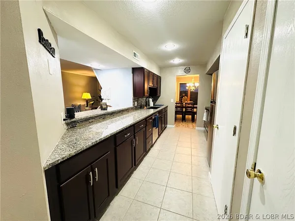 $275,000 | 33 Crow Court, Unit 2E, Lake Ozark, MO 65049
