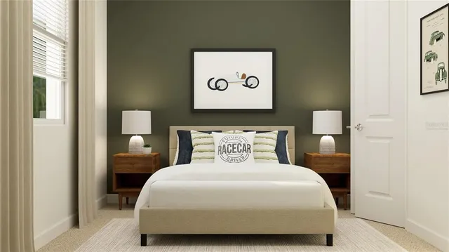 a bedroom with a bed and a painting on the wall