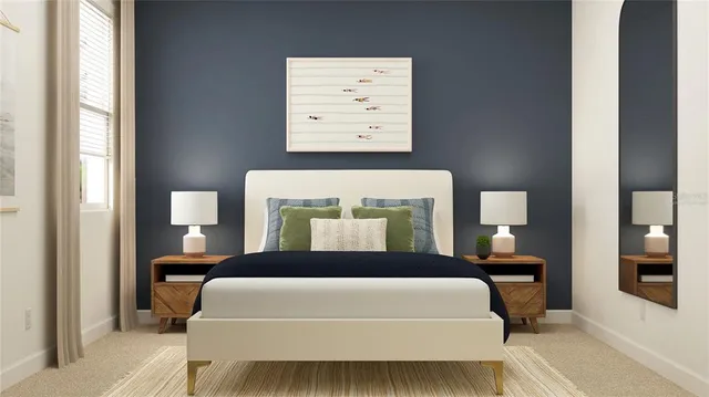 a bedroom with a large bed and a night stand