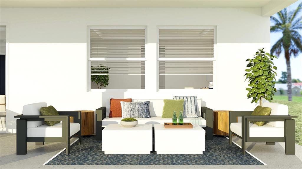 5635 Banyan Bay Road St. Cloud, FL 34771 - Photo 22 of 34 a living room with furniture and a window