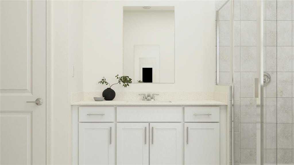 5635 Banyan Bay Road St. Cloud, FL 34771 - Photo 26 of 34 a bathroom with a sink vanity and mirror