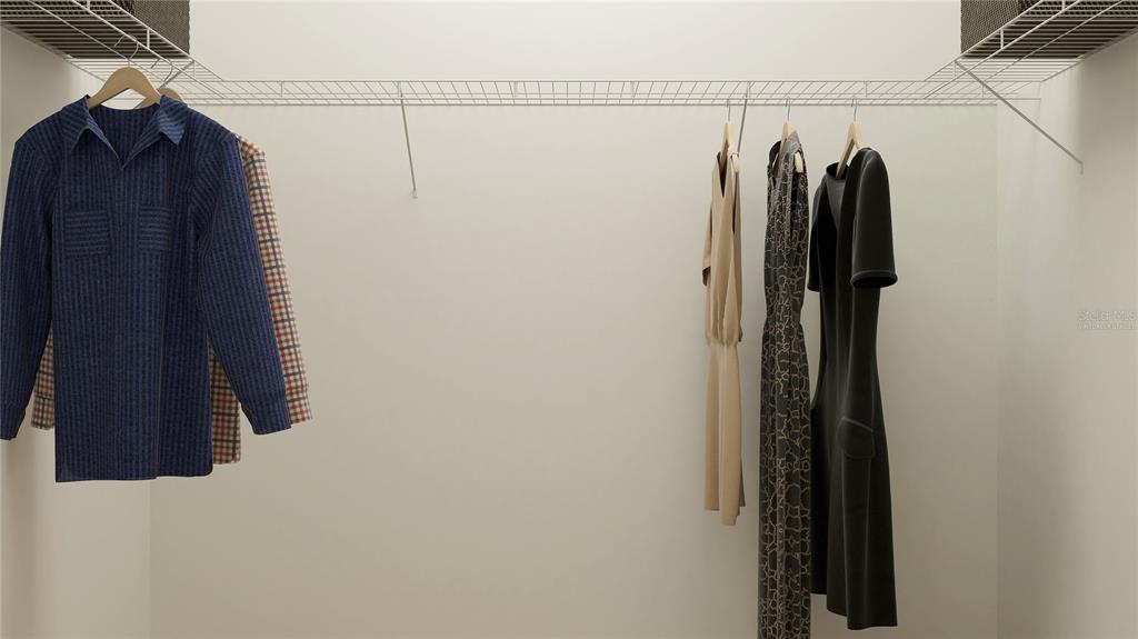 5635 Banyan Bay Road St. Cloud, FL 34771 - Photo 29 of 34 a close view of a walk in closet