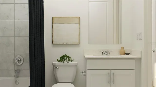 a bathroom with a sink toilet and vanity