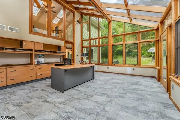 a bed room with a bed and a window