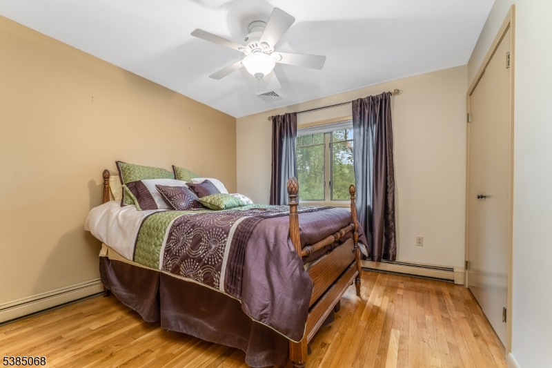 168 Locktown Sergeantsville Road Stockton, NJ 08559 - Photo 21 of 30 a bedroom with a bed and a window