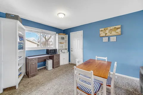 a bedroom with furniture and a window