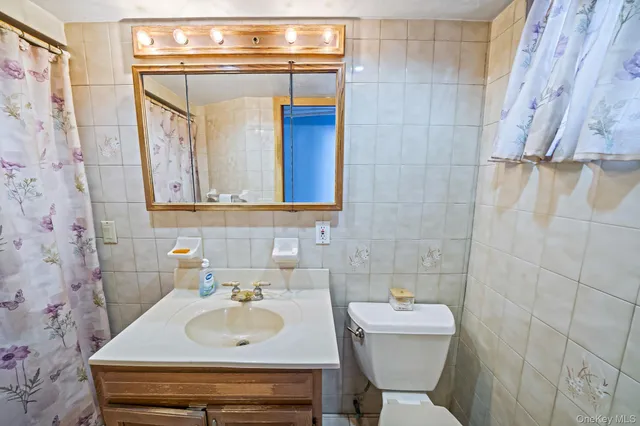 $910,000 | 60-51 71st Street | Maspeth