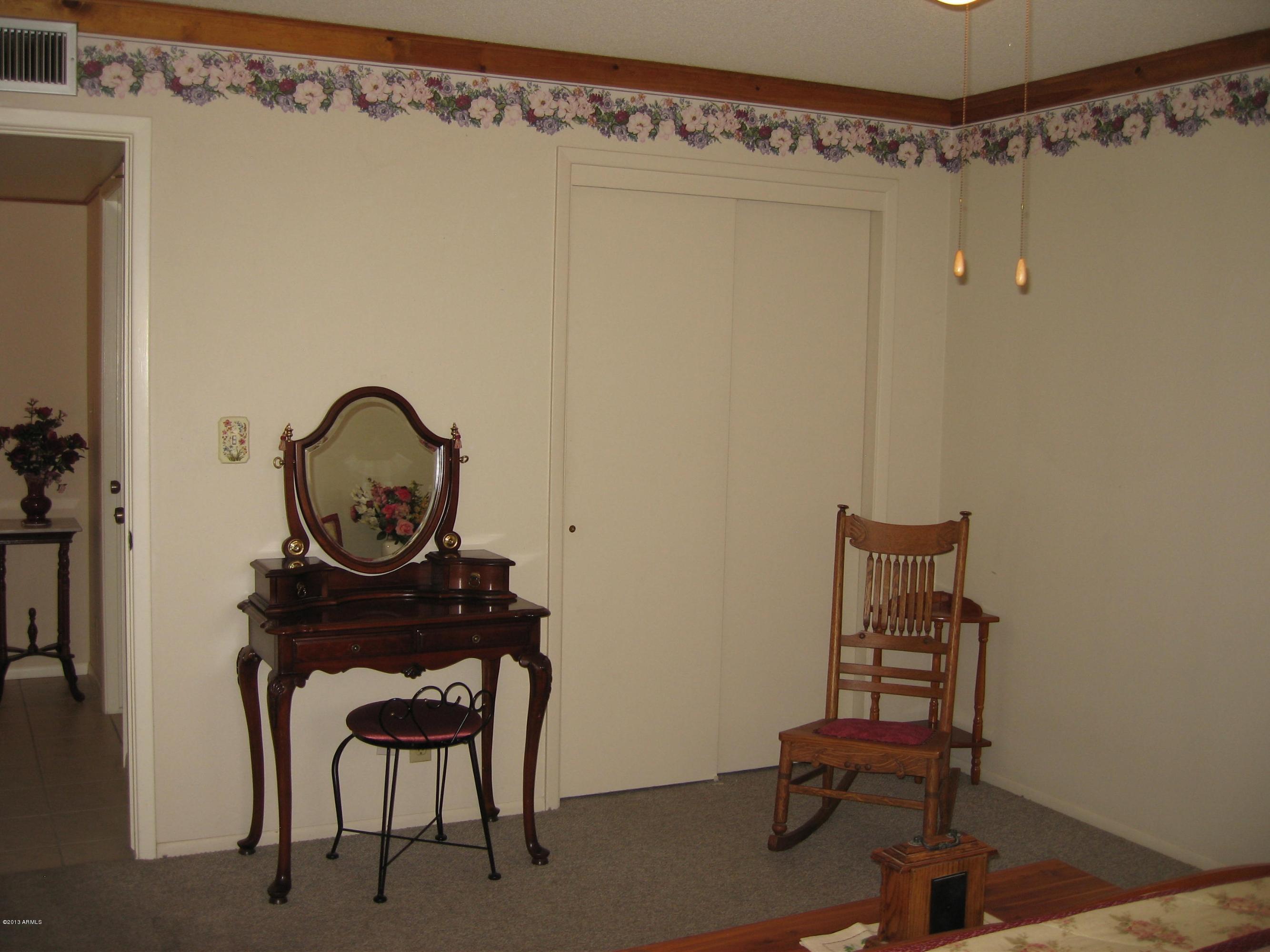 6529 East Decatur Street Mesa, AZ 85205 - Photo 20 of 50 Living Room with Lighted Ceiling Fan