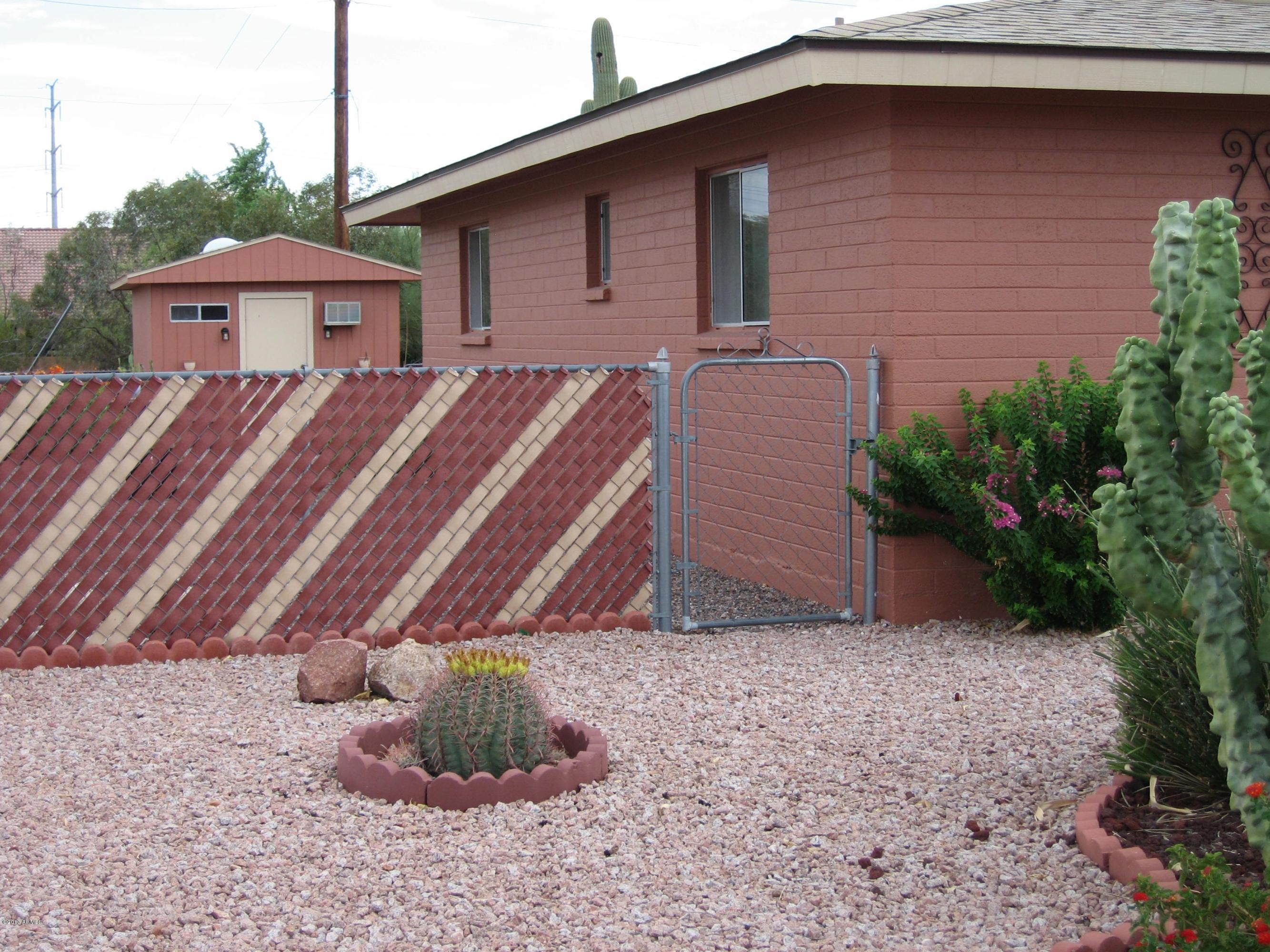 6529 East Decatur Street Mesa, AZ 85205 - Photo 44 of 50 East Side of Home with Gate