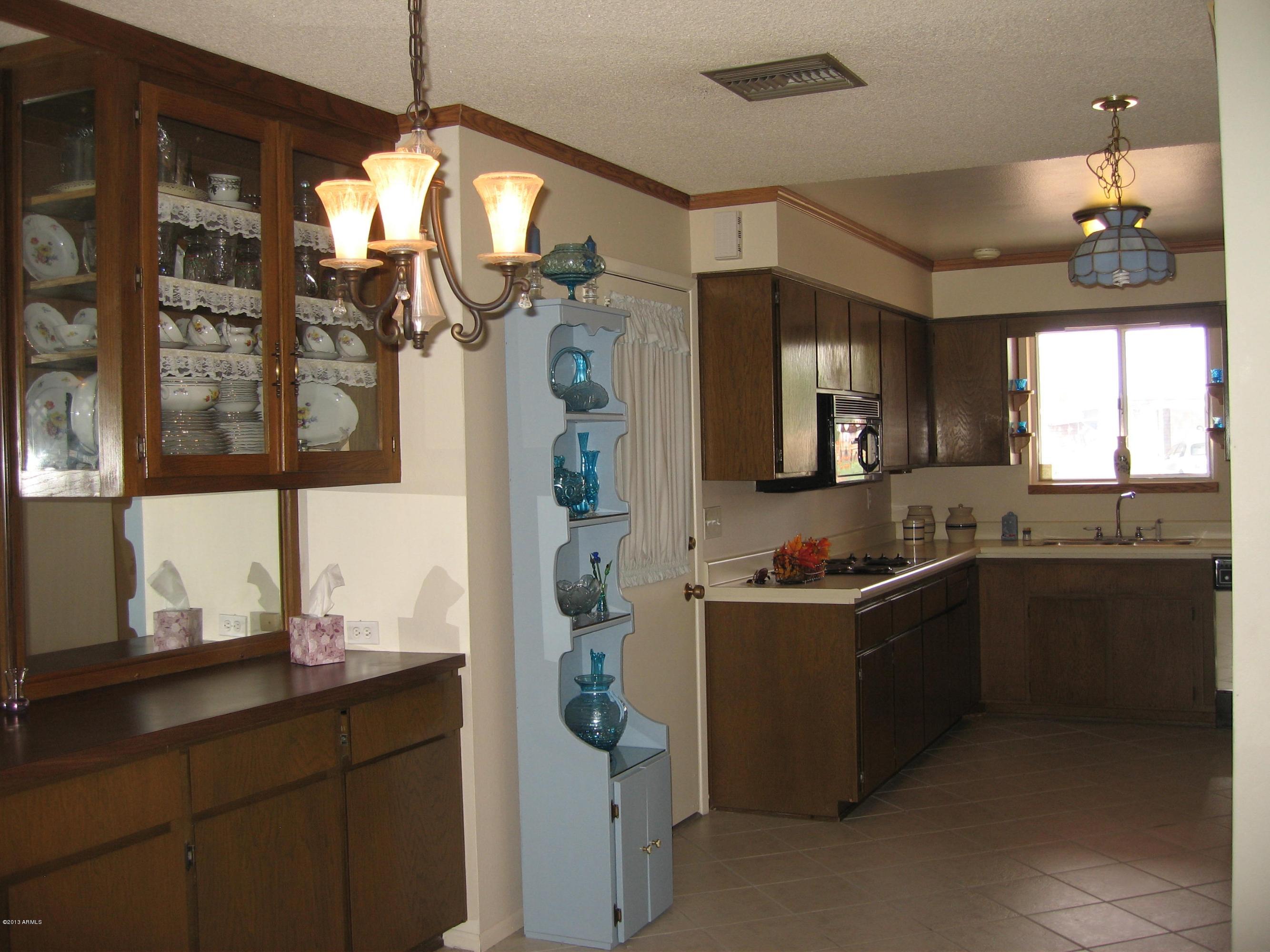 6529 East Decatur Street Mesa, AZ 85205 - Photo 8 of 50 View: Dining Room to Eat-In & Kitchen